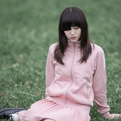 ((OTN)), masterpiece, best quality, highres, gotou1, gotou hitori, solo, skirt, pink jacket, track jacket, bangs, hair between eyes, long sleeves, , sitting, field, shaded face