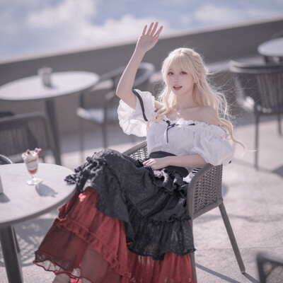 1girl, solo, lazypos, delicate, dreamy, dutch angle, high angle side view, looking at viewer, cinematic lighting, cinematic, volumetric lighting, ray tracing, natural shadows, clouds, blue sky, soft and gentle colors, soft pastel colors, soft shading, detailed textures, , kaela20, blonde hair, red eyes, long hair, off-shoulder blouse with layered maxi skirt, white blouse, strapless dress, collarbone, layered skirt, black skirt, red skirt, modern architecture, outdoors, outdoor cafe, sitting, sitting on chair, table, parfait, smile, open mouth, waving, waving hand, usnr