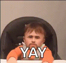 Baby Celebrates With Arms Raised