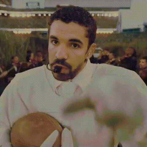 Bad Bunny Football Player Gesture