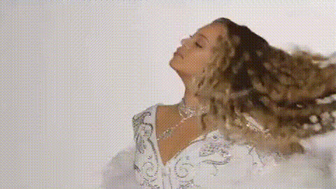 Beyoncé Smiling With Hands Up