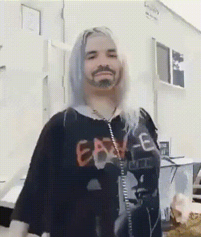 Billie Eilish Smiling Covering Mouth