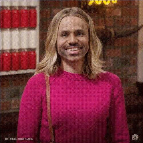 Blonde Woman Smiling Thumbs Up