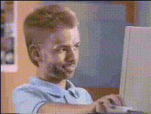 Boy Typing On Computer