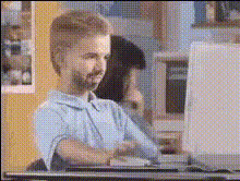 Boy Using Old Computer