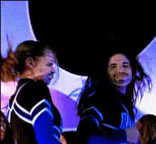 Cheerleaders Dancing Together