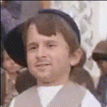 Child In A Hat Smiles