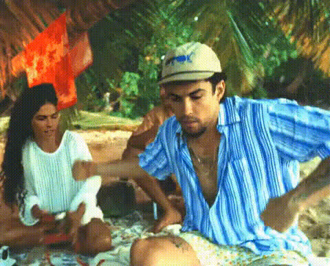 Couple On Beach Relaxing