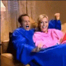 Couple On Couch With Blankets