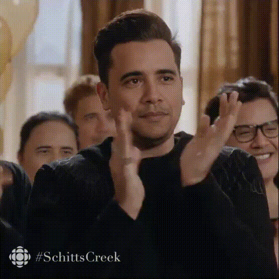 Dan Levy Smiling And Clapping