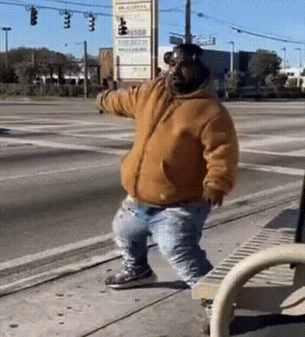 Dancing Man On Sidewalk