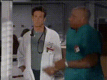 Doctors Talking In Hospital