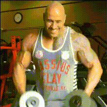 Dwayne Johnson Lifting Dumbbells