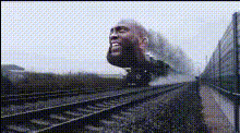 Giant Head On Train