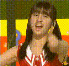 Girl Gives Thumbs Up Smiling