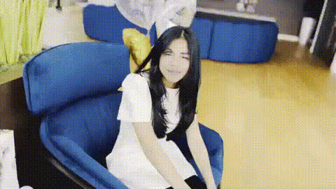 Girl Sitting On Blue Chair