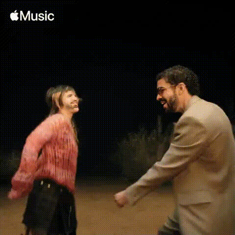 Happy Dancing Man And Woman