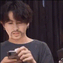 Jungkook Holding A Phone