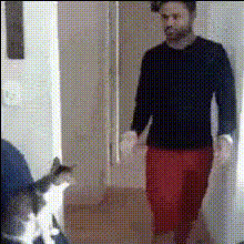 Man And Cat Playing