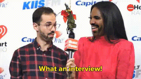 Man And Woman Being Interviewed