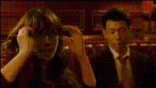 Man And Woman Sitting Indoors