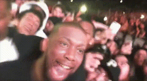 Man Celebrating In A Crowd