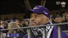 Man Cheering At Football Game