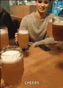 Man Cheering With Beer Friends