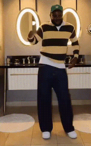 Man Dancing In A Bathroom