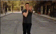 Man Dancing On City Street