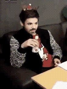 Man Drinking From Bottle