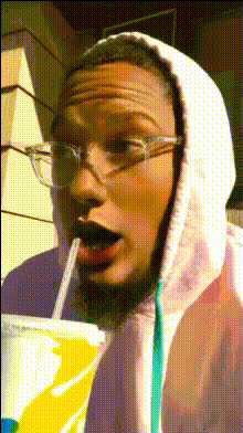 Man Drinking From Cup