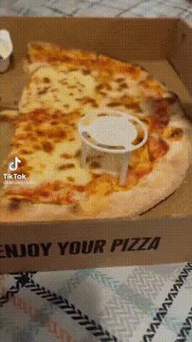 Man Eating Pizza Slice