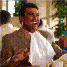 Man Eating With Napkin