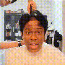 Man Getting Hair Combed