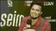 Man Holding Microphone Smiling