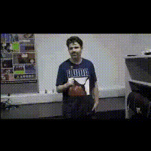 Man Holds A Microphone