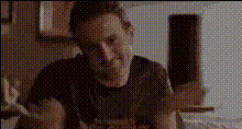 Man In Bare Guitars Shirt