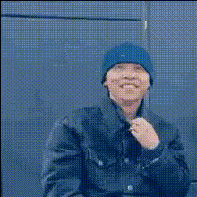 Man In Blue Hat Smiling