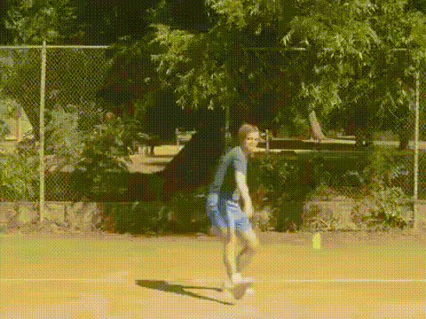 Man In Blue Shirt Throwing