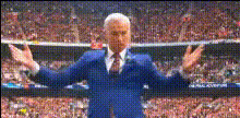 Man In Blue Suit Cheering