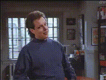 Man In Blue Sweater Standing