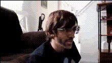Man In Glasses On Couch
