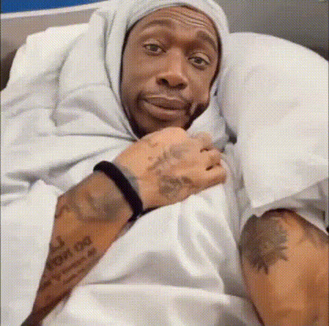 Man In Hospital Bed