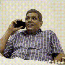 Man In Plaid Shirt Talking