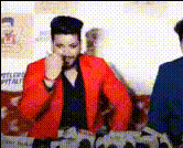Man In Red Jacket Smiling 1