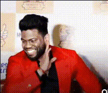 Man In Red Jacket Smiling
