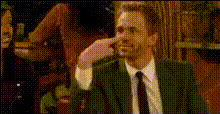 Man In Suit Gesturing