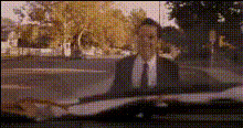 Man In Suit Looks Out