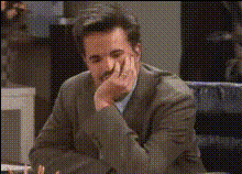 Man In Suit Sitting Shocked